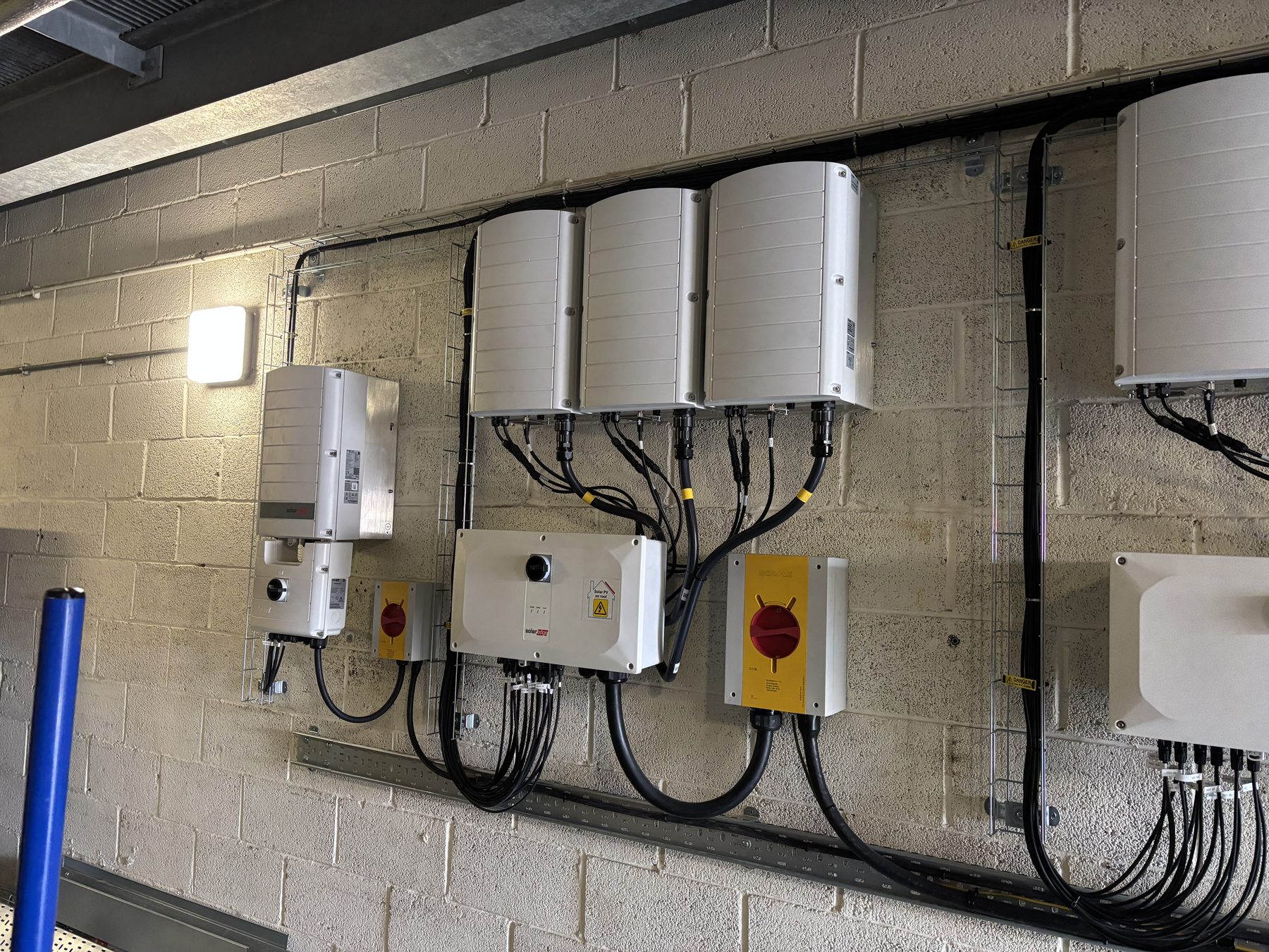 SolarEdge inverters and combiner boxes at Rainbow Leisure Centre