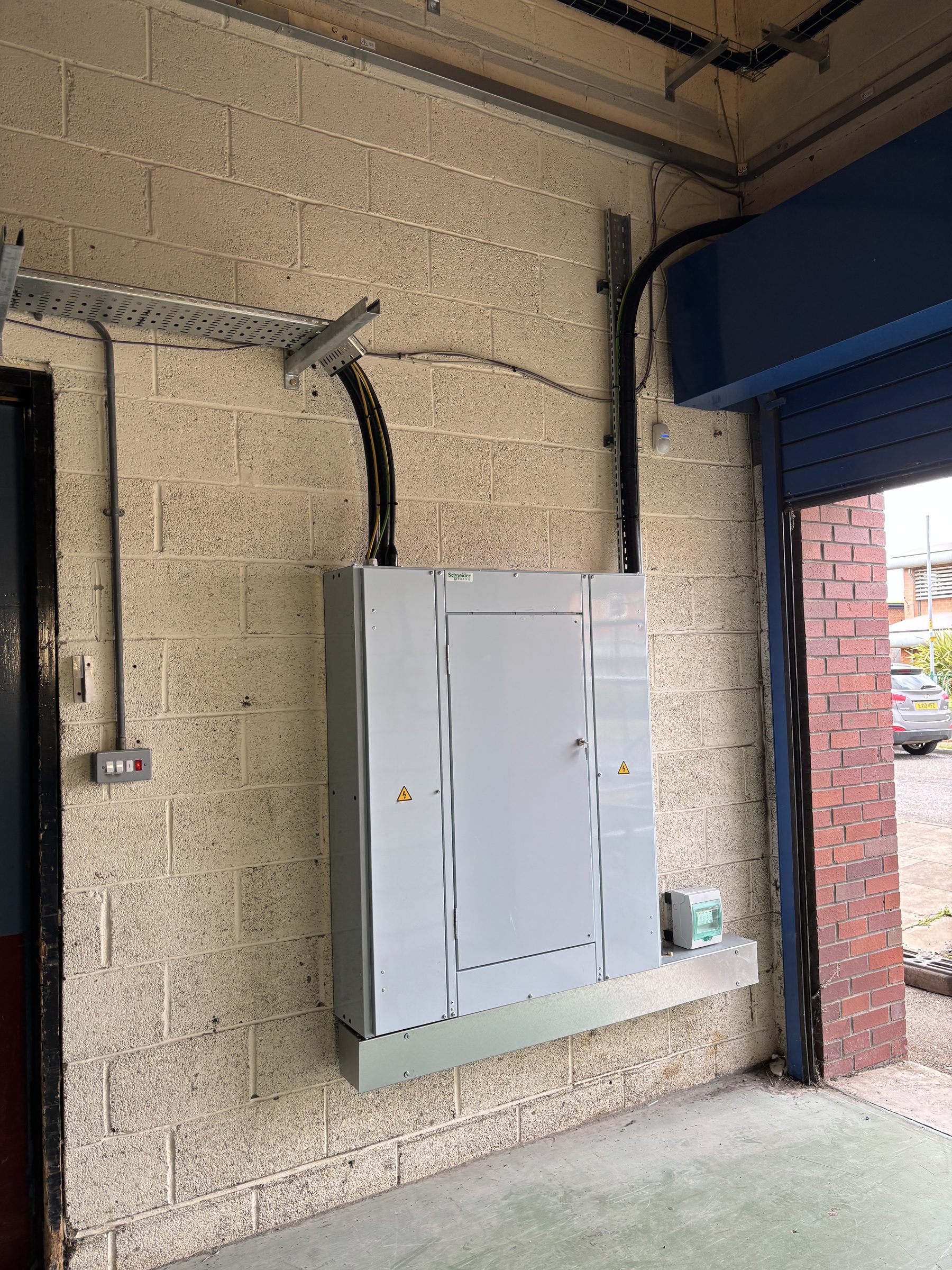AC isolation enclosure and cable containment for the Rainbow Leisure Centre solar installation