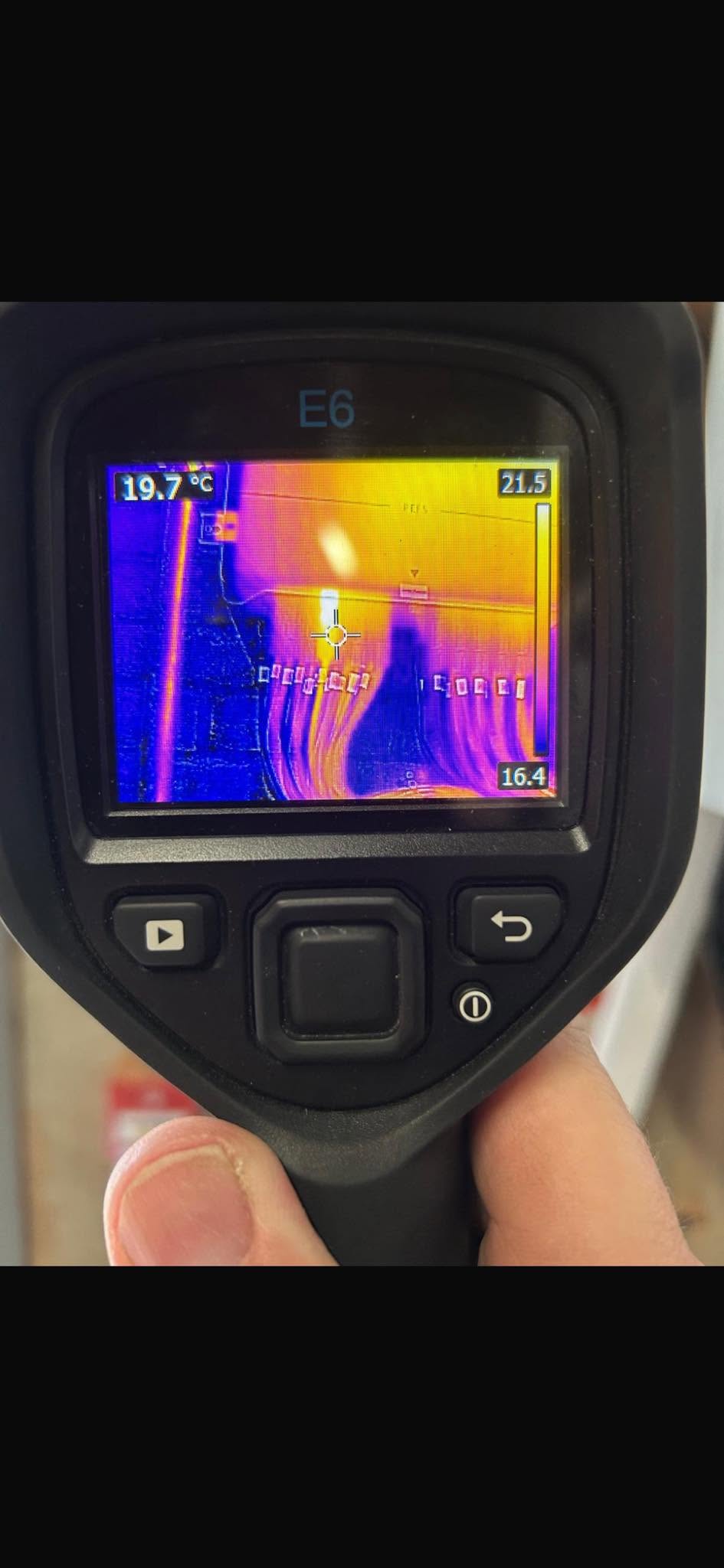 Thermal-imaging survey showing a hot-spot at an overheating DC connection on a solar array